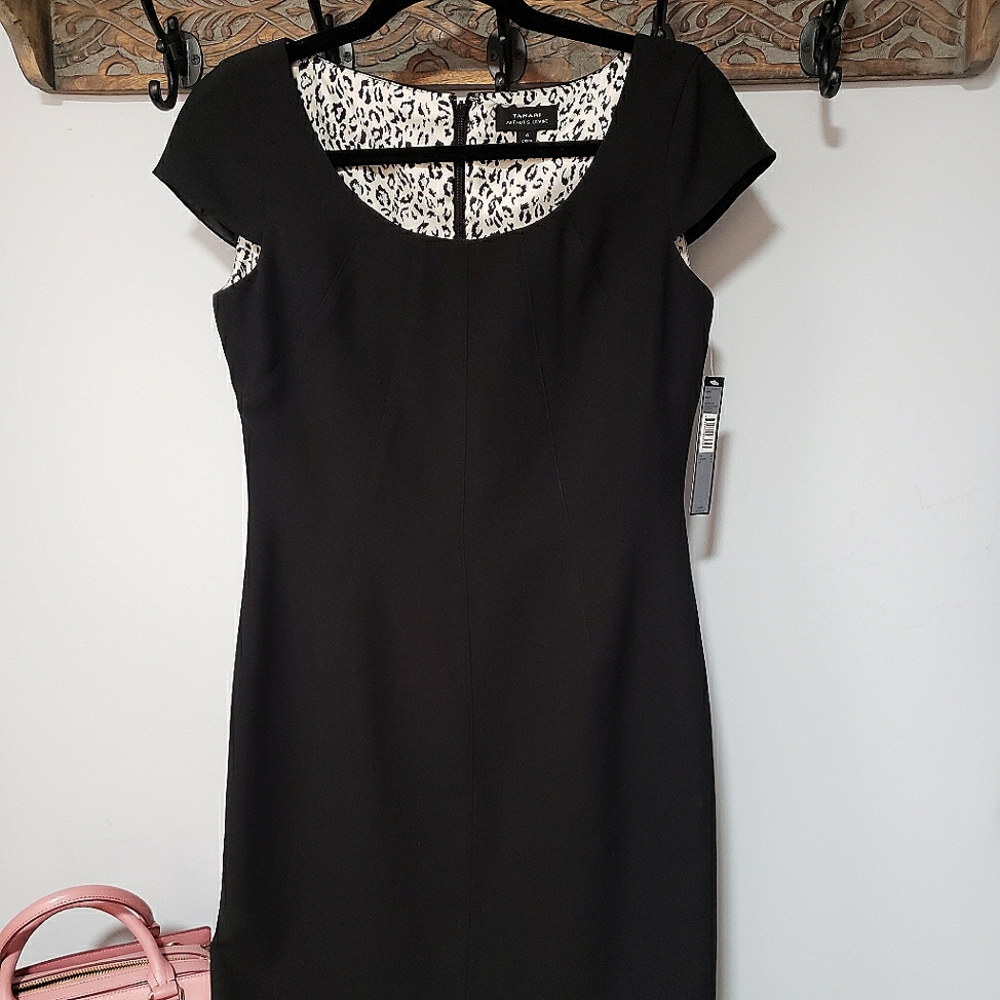 Elegant and classic Tahari Little Black dress with leopard lining. Never worn
